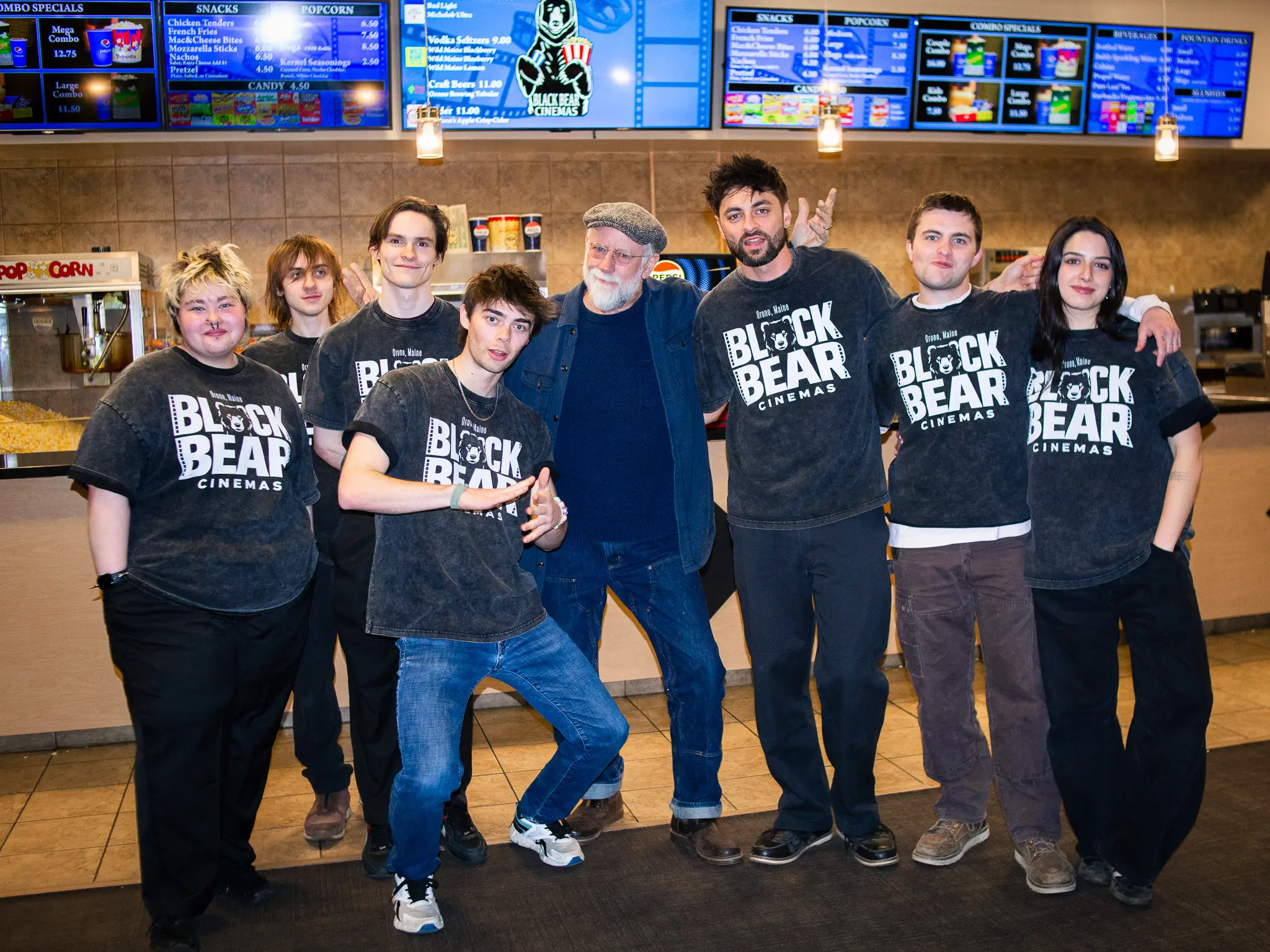 The cast of Saving Black Bear pose for a group photo.